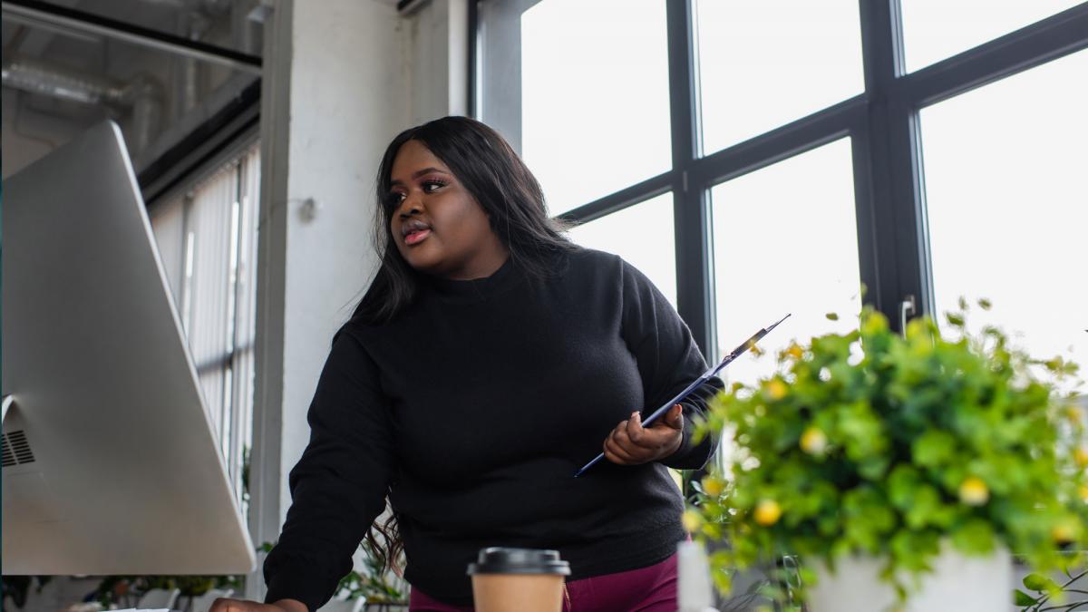 Photo of Worker in Office Environment
