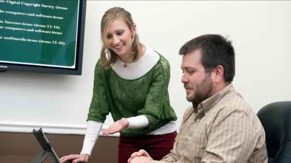 Photo of Worker in Office Environment